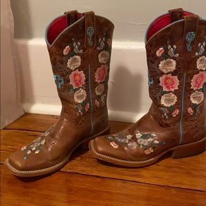 Brown cowboy boots with flowers.